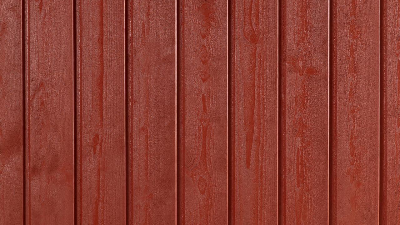 Stående kledning i 0025 Rørosrød fra Jotun.